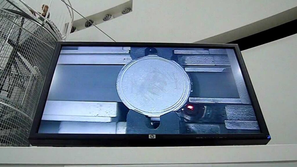 Heureka, coin laser engraving